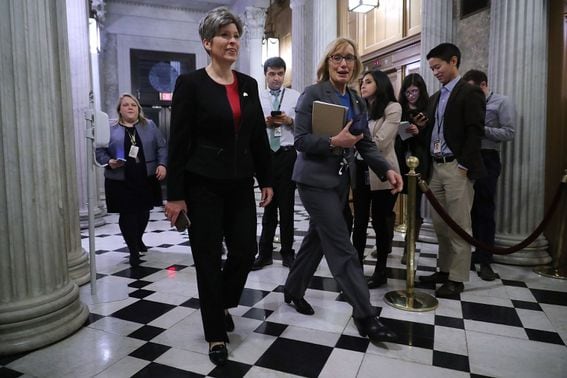 U.S. Senators Joni Ernst (R) and Maggie Hassan (Chip Somodevilla/Getty Images)