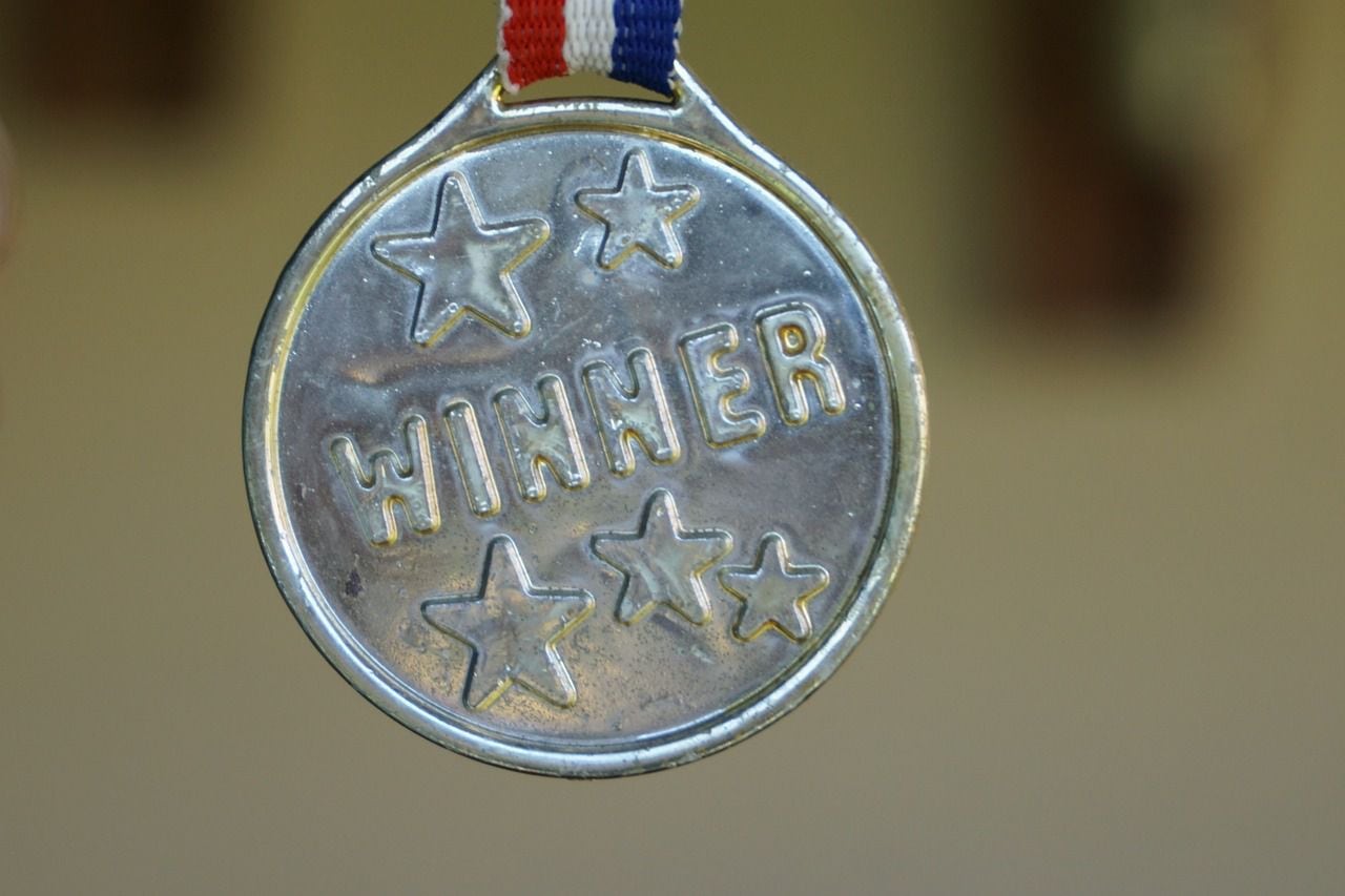 Winner, medal, gold. (AxxLC/Pixabay)
