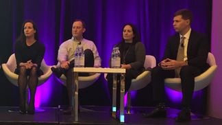 Christine Sandler (second from right) at an American Banker conference in 2018, photo by Marc Hochstein for CoinDesk