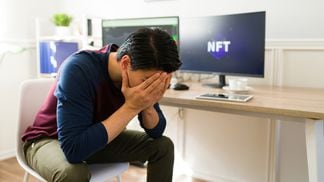 Sad NFT trader (Getty Images)