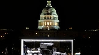 The 1981 DeLorean DMC-12 from the "Back to the Future" movie series is displayed on the National Mall in 2021 as part of the annual Cars at the Capitol exhibit. (Kevin Dietsch/Getty Images)