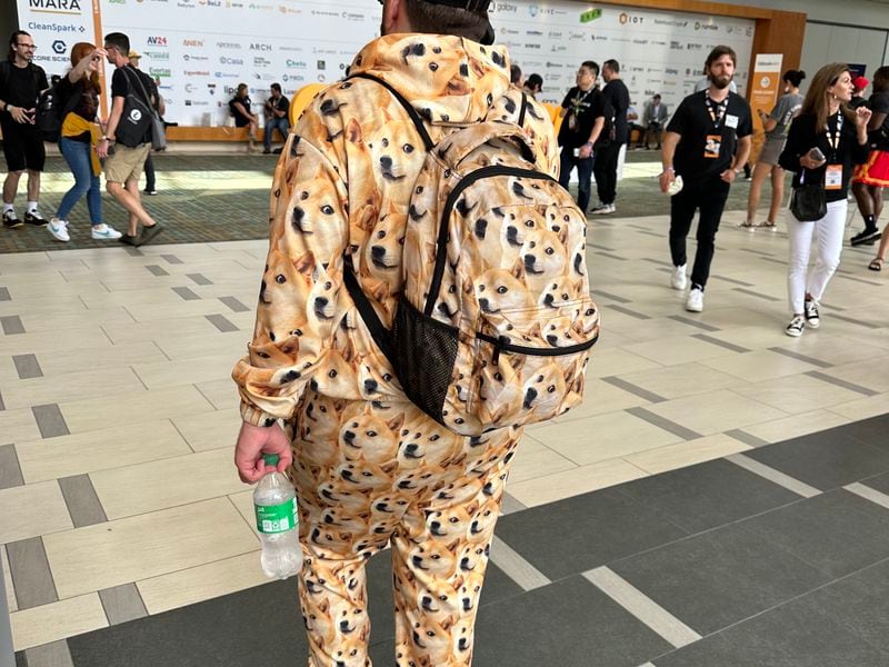 Conference attendee wearing Dogecoin track suit (Bradley Keoun)