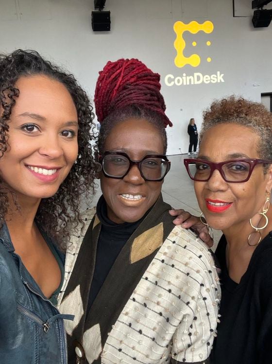Three members of the founding EVOLVE team and Disruptor DAO, at CoinDesk's I.D.E.A.S. conference. From left to right: Olivia Drouhaut, Zawadi Vanessa Fulston-Thomas and Sheila Ruiz.