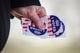 DENVER, COLORADO - MARCH 5: An election judge holds "I Voted" stickers while collecting drive-thru ballots on March 5, 2024 outside the Highland Recreation Center in Denver, Colorado. 15 States and one U.S. Territory hold their primary elections on Super Tuesday, awarding more delegates than any other day in the presidential nominating calendar.  (Photo by Marc Piscotty/Getty Images)