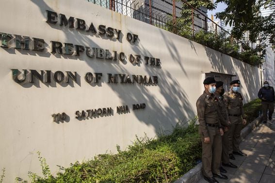Thai police officers stand guard outside the Embassy of Myanmar in Bangkok, Thailand, on Monday, Feb. 1 2021. 