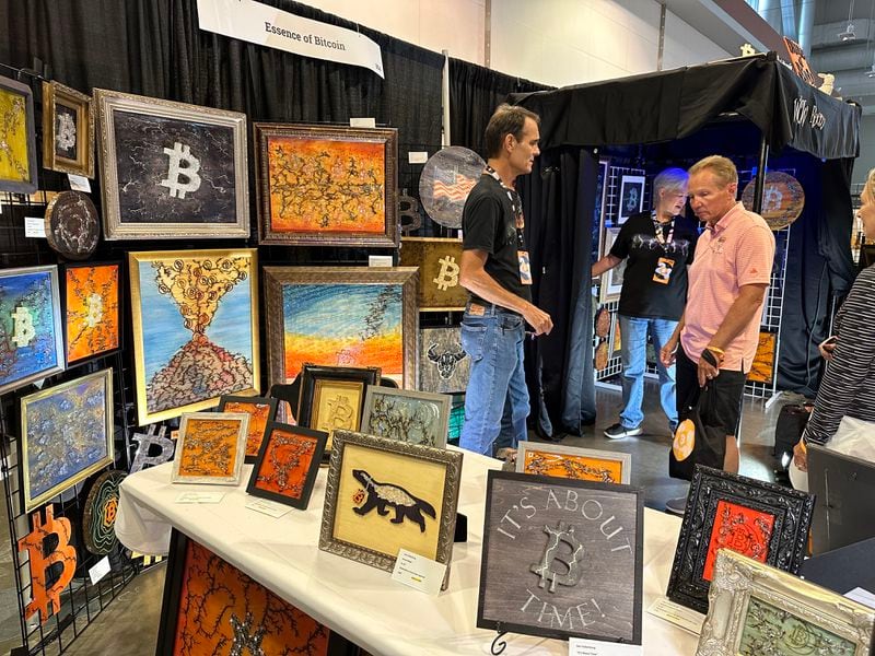 Vendor selling Bitcoin art (Bradley Keoun)