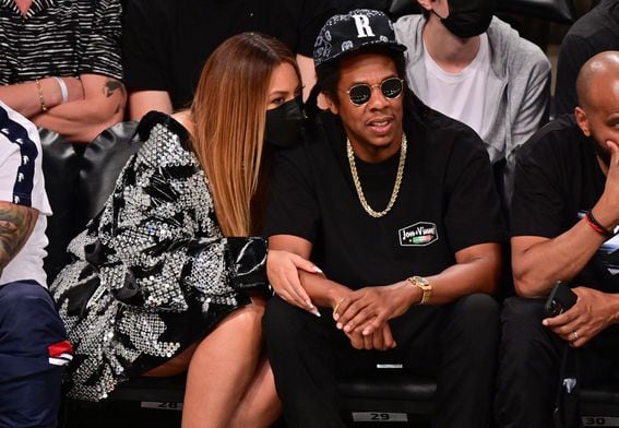 Jay-Z in Oliver Peoples Daddy B Sunglasses and Louis Vuitton Sneaker Boot